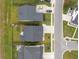 An aerial view of homes featuring well-maintained lawns and gray roofs at 404 Omaha Dr, Moncks Corner, SC 29461
