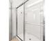 Modern bathroom featuring an enclosed shower with white tiling, chrome fixtures, and a glass sliding door at 404 Omaha Dr, Moncks Corner, SC 29461