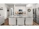 Kitchen featuring stainless steel appliances, granite countertops, an island, and a kitchen table with seating at 404 Omaha Dr, Moncks Corner, SC 29461