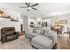 Open-concept living room and kitchen featuring modern finishes and plenty of natural light at 404 Omaha Dr, Moncks Corner, SC 29461