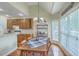 Cozy breakfast nook with bright windows, chandelier, and vaulted ceilings providing ample natural light at 416 Prestwick Ct, Summerville, SC 29483