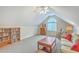 Upstairs living room with pitched ceiling, ceiling fan, comfortable furnishings, and large window at 416 Prestwick Ct, Summerville, SC 29483