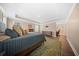 Large main bedroom with a tray ceiling, complemented by wood floors and a seating area, perfect for relaxation at 436 Rowley Ln, Summerville, SC 29486