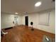 Spacious living room with wooden floors and natural light, offering a cozy atmosphere at 4406 Holmes Ave, North Charleston, SC 29405