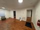 Spacious living room with wood floors and natural light at 4406 Holmes Ave, North Charleston, SC 29405