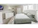 Relaxing bedroom features a neutral palette, large bed, and abundant storage with dresser and closet at 49 Auld Brass Rd, Walterboro, SC 29488