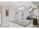 Modern kitchen featuring granite countertops, a center island, and updated appliances at 49 Auld Brass Rd, Walterboro, SC 29488