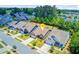A row of lovely homes featuring charming exteriors and landscaped yards at 5078 Song Sparrow Way, Summerville, SC 29483