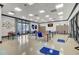Bright craft room with ample workspace, storage lockers, and natural light at 5078 Song Sparrow Way, Summerville, SC 29483
