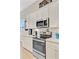 A well-equipped kitchen with stainless steel appliances and white cabinets at 5078 Song Sparrow Way, Summerville, SC 29483