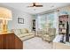 Comfortable living room with couch, chair and built-in bookcases at 5078 Song Sparrow Way, Summerville, SC 29483