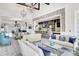 Spacious lounge with elegant furnishings, stylish bar area, and sophisticated design elements at 5078 Song Sparrow Way, Summerville, SC 29483