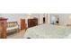 Bright bedroom showcasing wood floors and furnishings alongside a large window for plenty of natural light at 5078 Song Sparrow Way, Summerville, SC 29483
