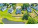 Home features a fenced yard and scenic pond views that add to its charm at 5128 Thornton Dr, Summerville, SC 29485