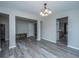 Bright living room showcasing hard surface flooring and neutral wall color at 5128 Thornton Dr, Summerville, SC 29485