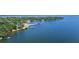 Beautiful aerial view of waterfront property and nearby harbor and pier at 513 Pauline Dr, Bonneau, SC 29431