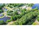 Overhead view showcasing a charming lakeside neighborhood with waterfront access and tree-lined streets at 513 Pauline Dr, Bonneau, SC 29431