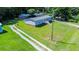 Stunning aerial view of home with new metal roof and well-maintained lawn at 513 Pauline Dr, Bonneau, SC 29431