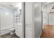 Cozy bathroom with white vanity, oval mirror, and shower-tub combination at 513 Pauline Dr, Bonneau, SC 29431