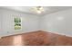 Bright bedroom with a ceiling fan and a large window offering natural light at 513 Pauline Dr, Bonneau, SC 29431