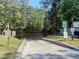 View of a boat ramp providing access to the water, with informational signage and surrounding trees at 513 Pauline Dr, Bonneau, SC 29431