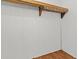 View of the closet featuring hardwood floors and a functional rack and shelf at 513 Pauline Dr, Bonneau, SC 29431