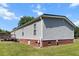 Back view of home features vinyl siding and a well-maintained front lawn at 513 Pauline Dr, Bonneau, SC 29431