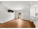 View of living room with wood floors and exterior door at 513 Pauline Dr, Bonneau, SC 29431