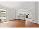 Cozy living room space featuring light-colored walls and wood floors at 513 Pauline Dr, Bonneau, SC 29431