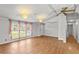 Living room with a front entrance and three front windows at 513 Pauline Dr, Bonneau, SC 29431
