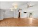 Spacious living room featuring hardwood floors and multiple ceiling fans at 513 Pauline Dr, Bonneau, SC 29431