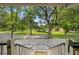 Inviting view of the large, landscaped backyard from the back porch at 6434 Saint Anthony Dr, Meggett, SC 29449