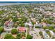 Beautiful Charleston neighborhood aerial shot with tree-lined streets, historic architecture and water views at 71 E Bay St, Charleston, SC 29401