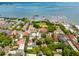Aerial view of the property showcasing the neighborhood, city skyline, and waterfront at 71 E Bay St, Charleston, SC 29401
