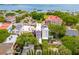 Picturesque aerial view of historic Charleston homes with waterfront views and lush greenery at 71 E Bay St, Charleston, SC 29401