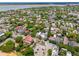Stunning aerial view of historic Charleston's cityscape, showcasing charming homes and waterfront views at 71 E Bay St, Charleston, SC 29401