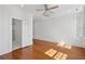 Open bedroom with hardwood floors and an attached bath at 71 E Bay St, Charleston, SC 29401