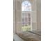 Bedroom detail highlighting window shutters and view at 71 E Bay St, Charleston, SC 29401