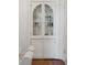 Charming built-in china cabinet featuring glass doors and crystal knobs at 71 E Bay St, Charleston, SC 29401