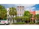 Charming Charleston home with a colorful facade, lovely landscaping, and curb appeal at 71 E Bay St, Charleston, SC 29401