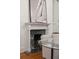 Close up of marble fireplace with white mantle in dining room at 71 E Bay St, Charleston, SC 29401