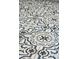 Close up of tile flooring with an intricate blue and white pattern at 71 E Bay St, Charleston, SC 29401