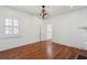 Bright living room with hardwood floors and a traditional chandelier at 71 E Bay St, Charleston, SC 29401