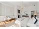 Bright, spacious main bedroom with a fireplace, sitting area, and large windows at 71 E Bay St, Charleston, SC 29401