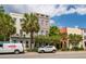 Charming Charleston home with a colorful facade, lovely landscaping, and curb appeal at 71 E Bay St, Charleston, SC 29401