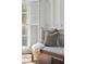 Window nook featuring shuttered windows and a cushioned bench at 71 E Bay St, Charleston, SC 29401
