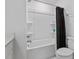 Bright bathroom with a shower-tub combo and modern fixtures at 768 Trotters Ln, Moncks Corner, SC 29461