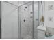 Modern bathroom features a glass shower door, tiled shower, and white countertop at 768 Trotters Ln, Moncks Corner, SC 29461