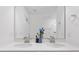 Bright bathroom featuring a double vanity with modern fixtures and a large mirror at 768 Trotters Ln, Moncks Corner, SC 29461
