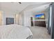 Comfortable main bedroom featuring neutral walls, plush carpet, and a large wall-mounted TV at 768 Trotters Ln, Moncks Corner, SC 29461